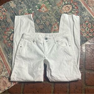 NY&C sits at lower waist slim slouch white denim jeans